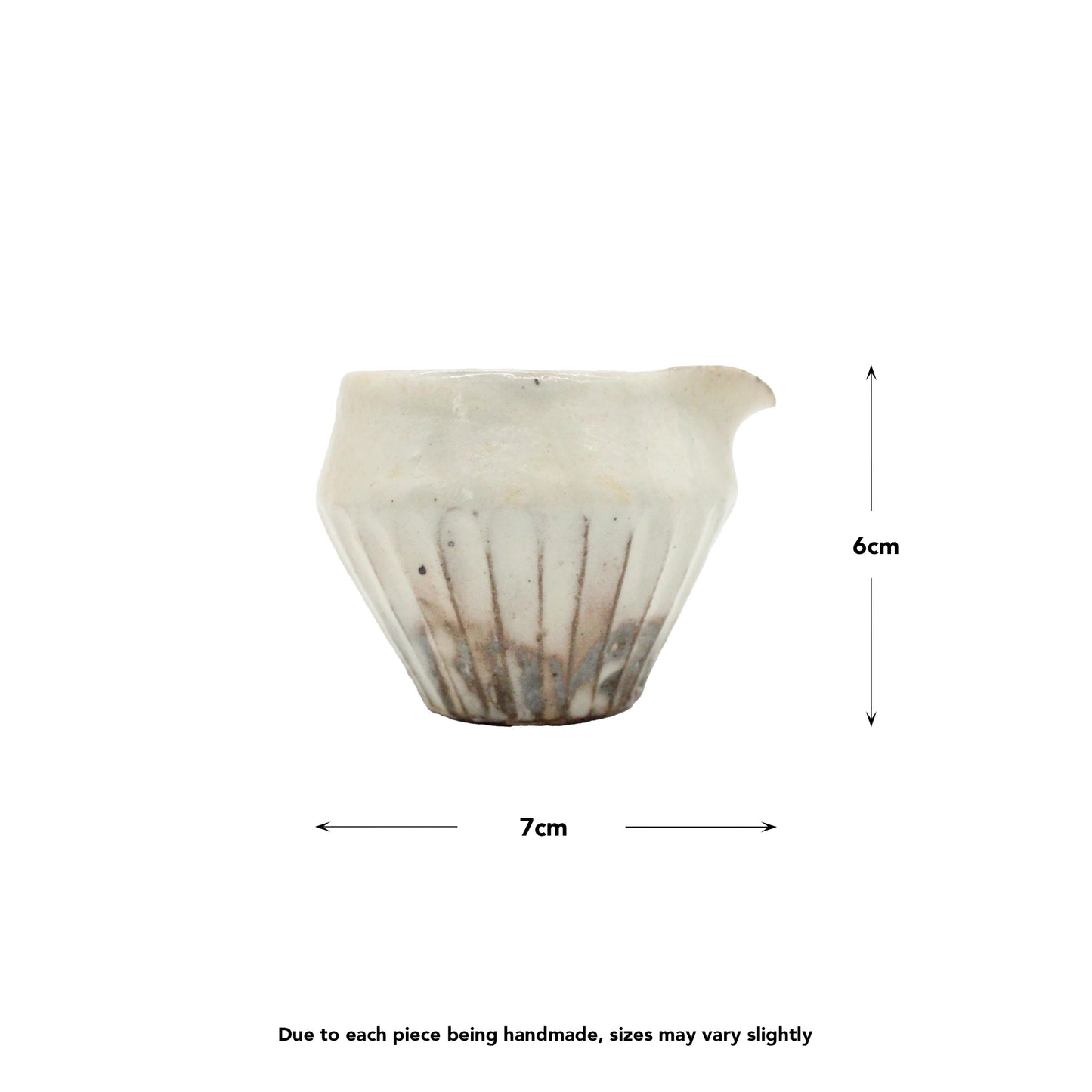 
                  
                    The Pourer - Iron Scatter is a small handmade ceramic Japanese pourer cup with a spout, crafted in the Shigaraki style. It measures 7 cm wide and 6 cm tall, with slight variations due to its handmade nature.
                  
                