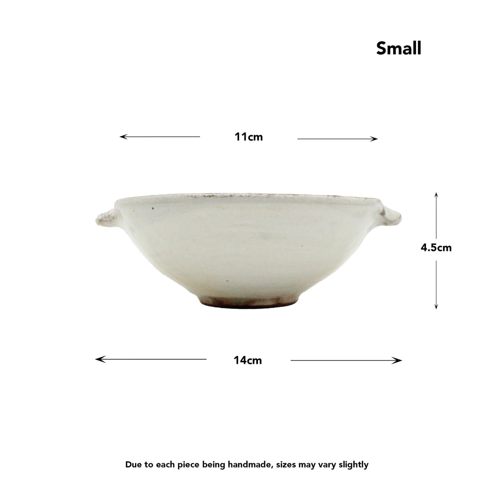 
                  
                    Ear Bowls - Fuchiara Carved: Small handmade Shigaraki pottery bowl with two side handles, approx. 14cm diameter, 4.5cm height, and 11cm top opening. Each features a unique Kohiki finish; size may slightly vary.
                  
                