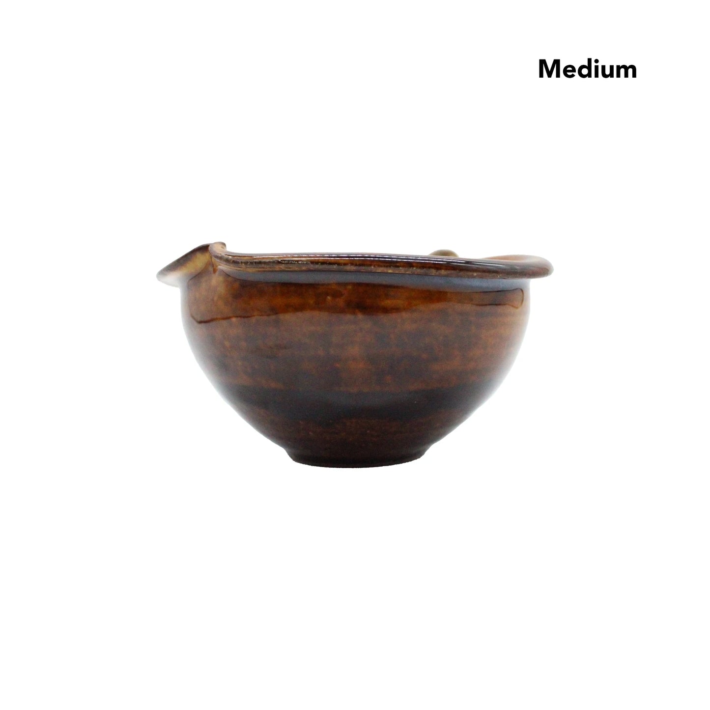 
                  
                    The Apple Bowls - Candy Glaze is a medium-sized brown ceramic bowl with a glossy finish and small pouring spout, inspired by Japanese pottery, shown on a plain white background.
                  
                