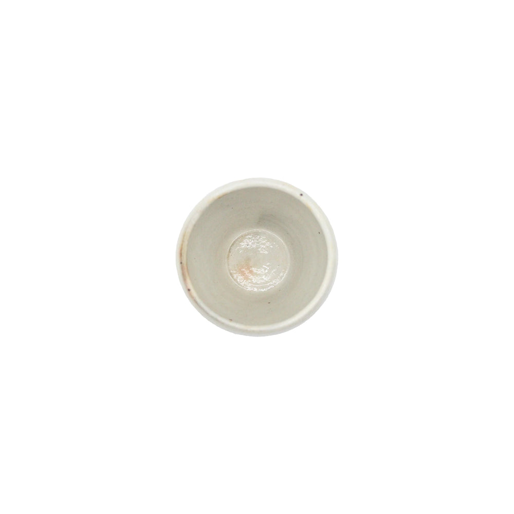 
                  
                    A Tea Mug - Iron Scatter is shown from above, empty and white with a subtle Kohiki finish, set against a plain white background.
                  
                