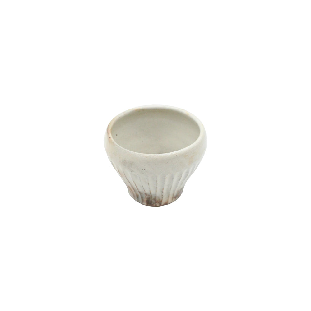 
                  
                    The Tea Mug - Iron Scatter features a beautiful Kohiki finish with brown spots on white, inspired by traditional Japanese pottery.
                  
                