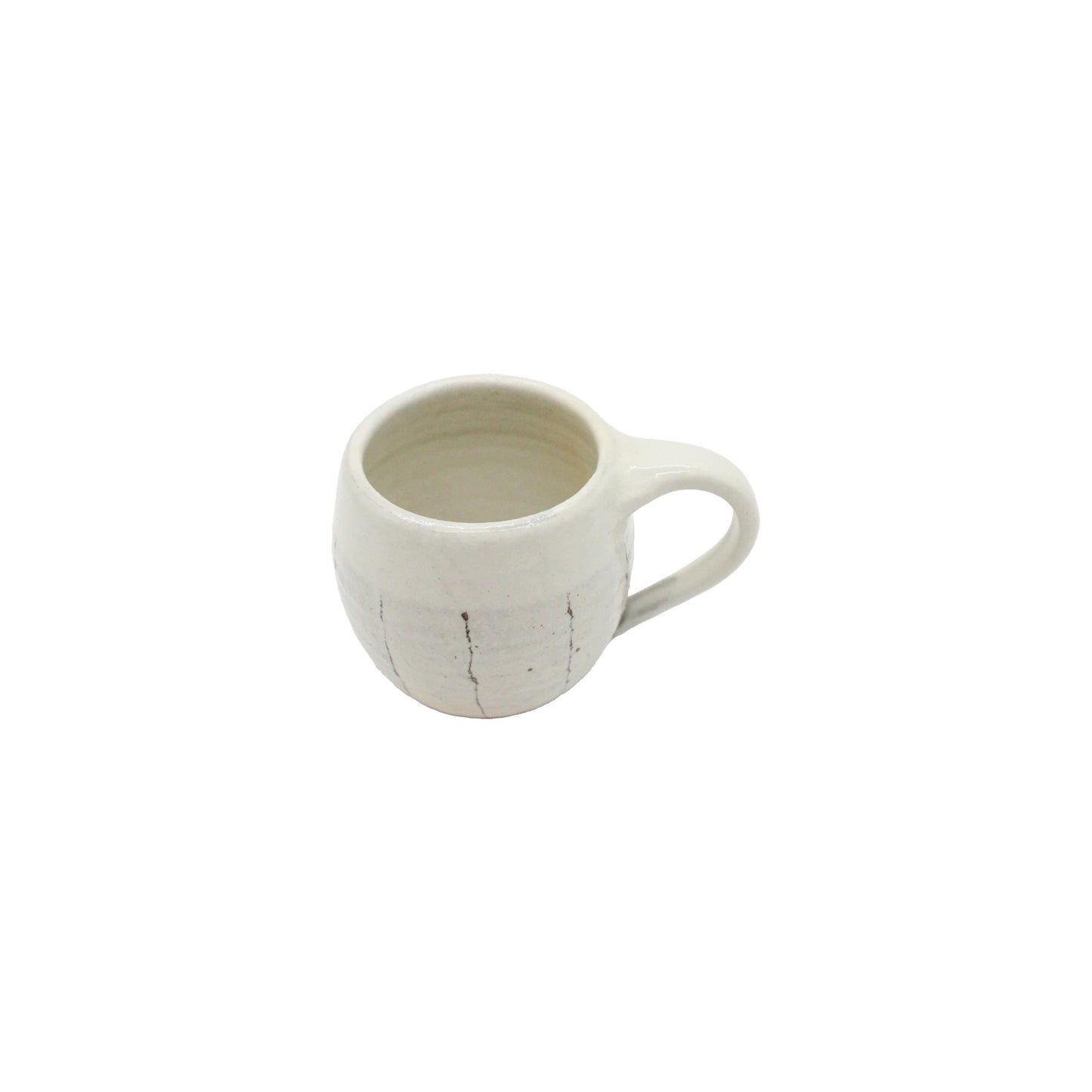 
                  
                    The Tea Mug with Handle - Iron Wire is a small, white handmade ceramic mug with a round body and handle, adorned with subtle vertical lines, placed on a plain white background.
                  
                