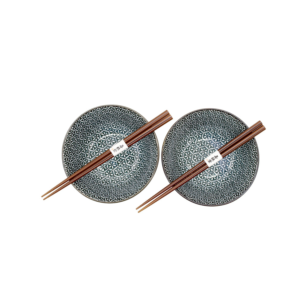 
                  
                    The Asanoha Flower Patterned Bowls Boxed Set - Deep Blue includes two Japanese bowls with an elegant design, each paired with matching wooden chopsticks, beautifully arranged against a white background.
                  
                