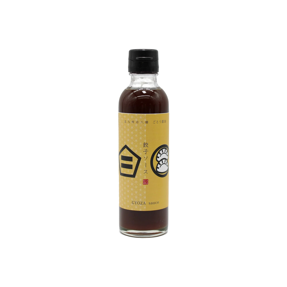 Gyoza Sauce - 200ml comes in a clear glass bottle with a yellow label, dark brown umami-rich sauce inside, and is sealed with a black cap.