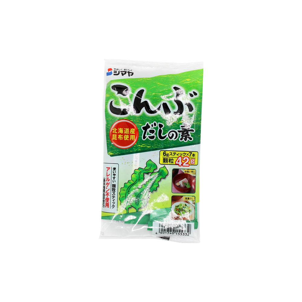 Shinmaya Kombu Dashi Powder is a plant-based Japanese seasoning mix with green and white packaging, Japanese text, and images of seaweed and soup on the front for authentic umami flavor.