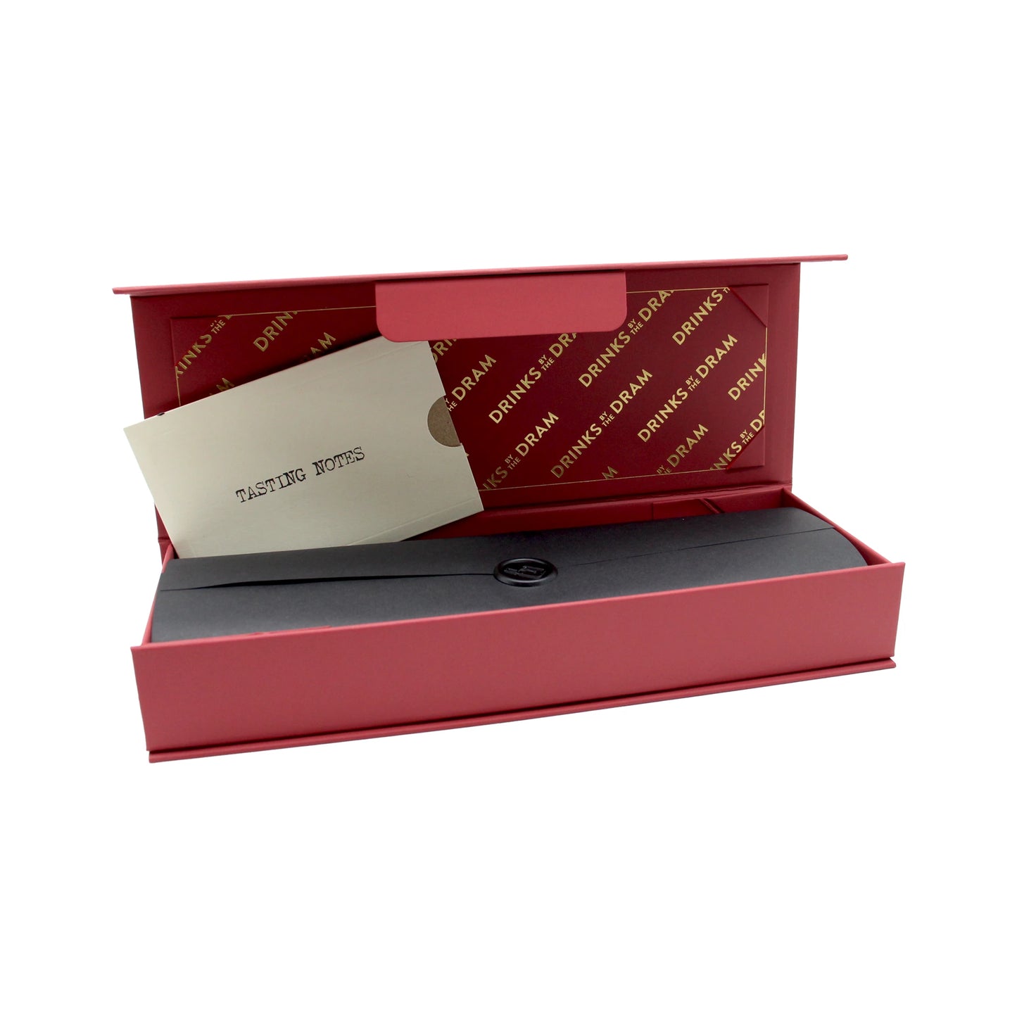 
                  
                    A pink rectangular box with gold text encloses The Japanese Whisky Premium Tasting Set, featuring a card labeled TASTING NOTES and a black envelope sealed with a wax stamp—an elegant presentation ideal for any whisky gift set, especially suited for connoisseurs of Japanese whisky such as the renowned Yamazaki 12 Year Old.
                  
                