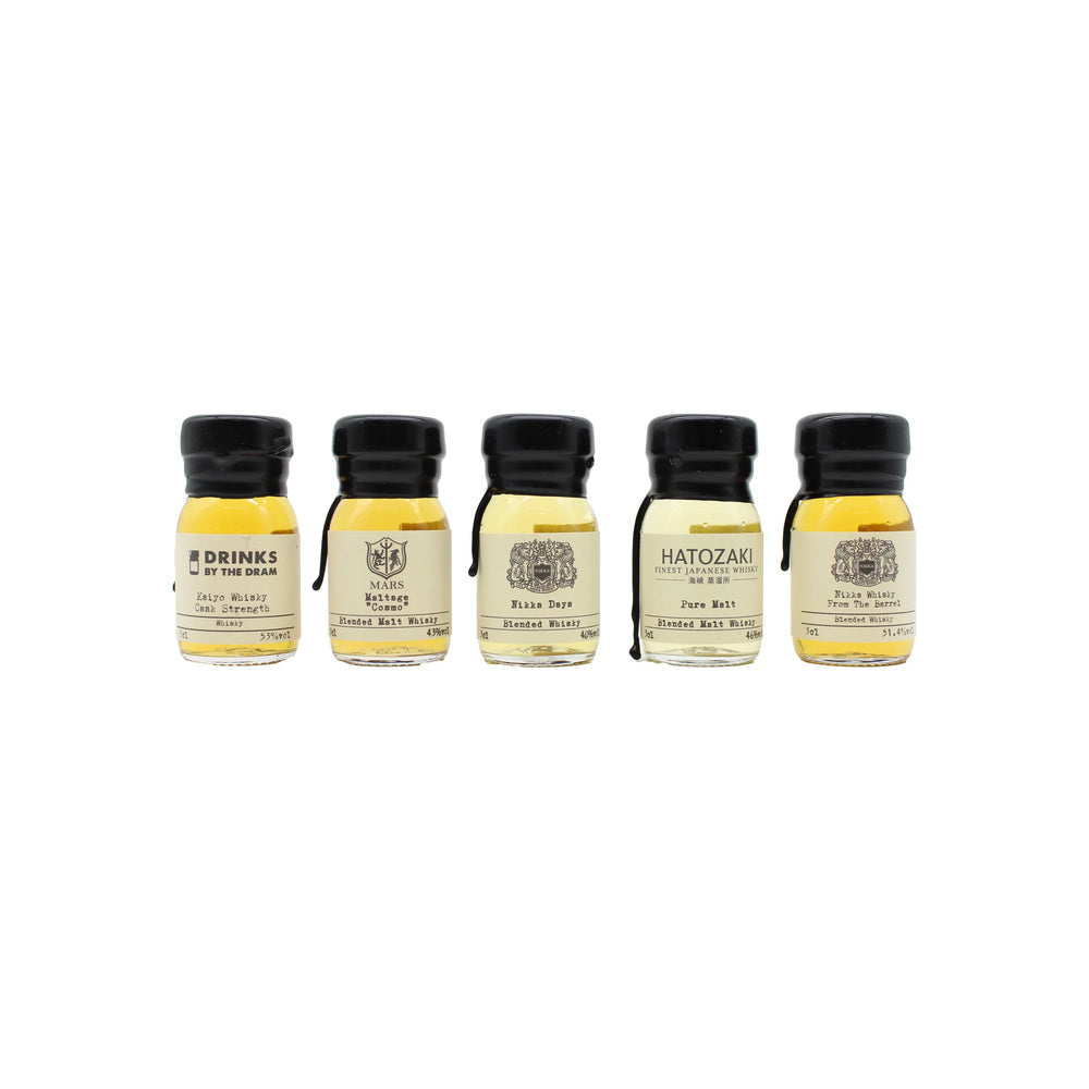 
                  
                    The Japanese Whisky Tasting Set features five small bottles, each with a unique label, arranged in a row against a white background—perfect for exploring diverse whisky styles.
                  
                