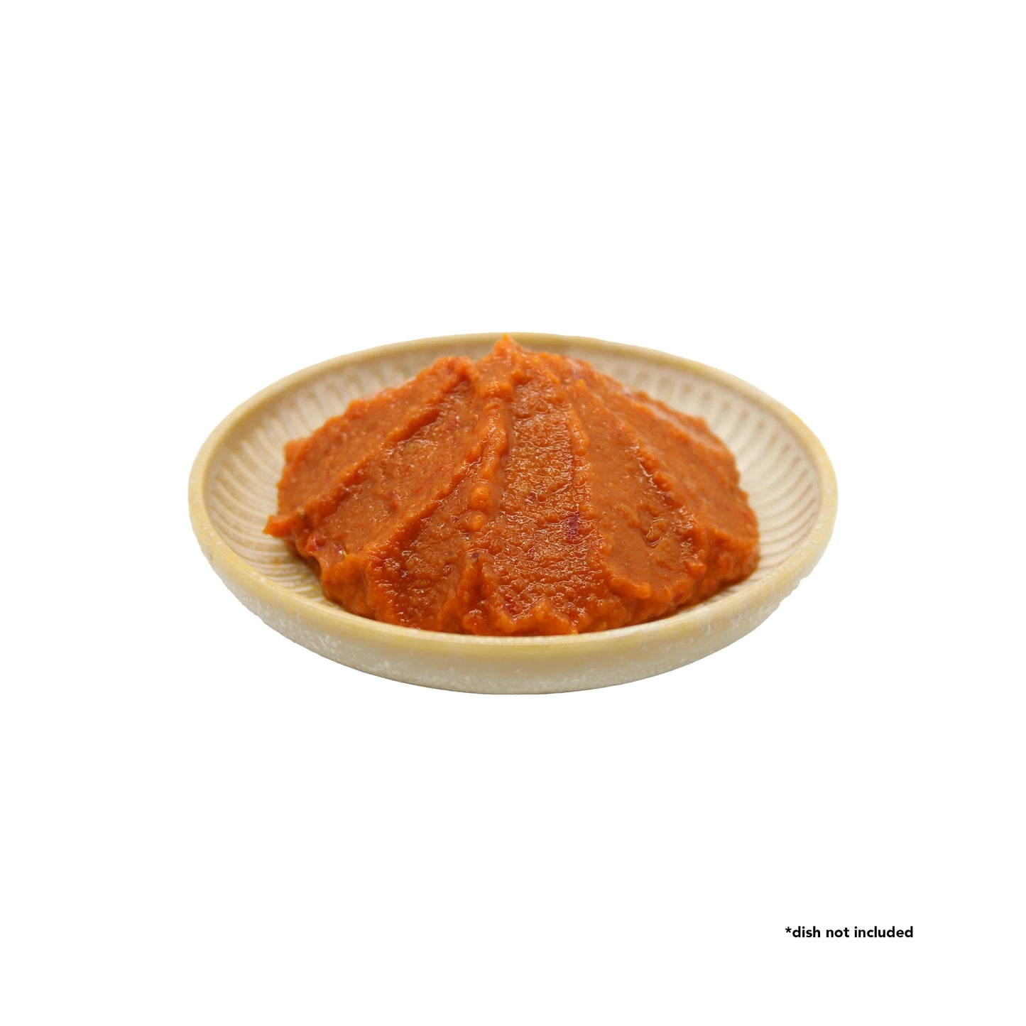 A mound of Kanzuri Fermented Red Chilli Paste - 100g sits on a small, round, beige plate; text in the corner reads *dish not included.