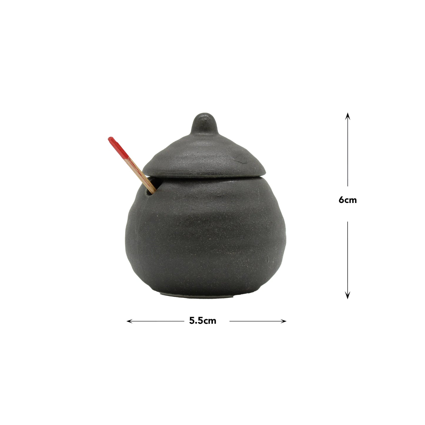 A small, round Karashi / Shichimi Spice Pot - Black Bizen, with a lid and red-tipped stick, measuring 5.5cm wide by 6cm tall, is shown against a white background.
