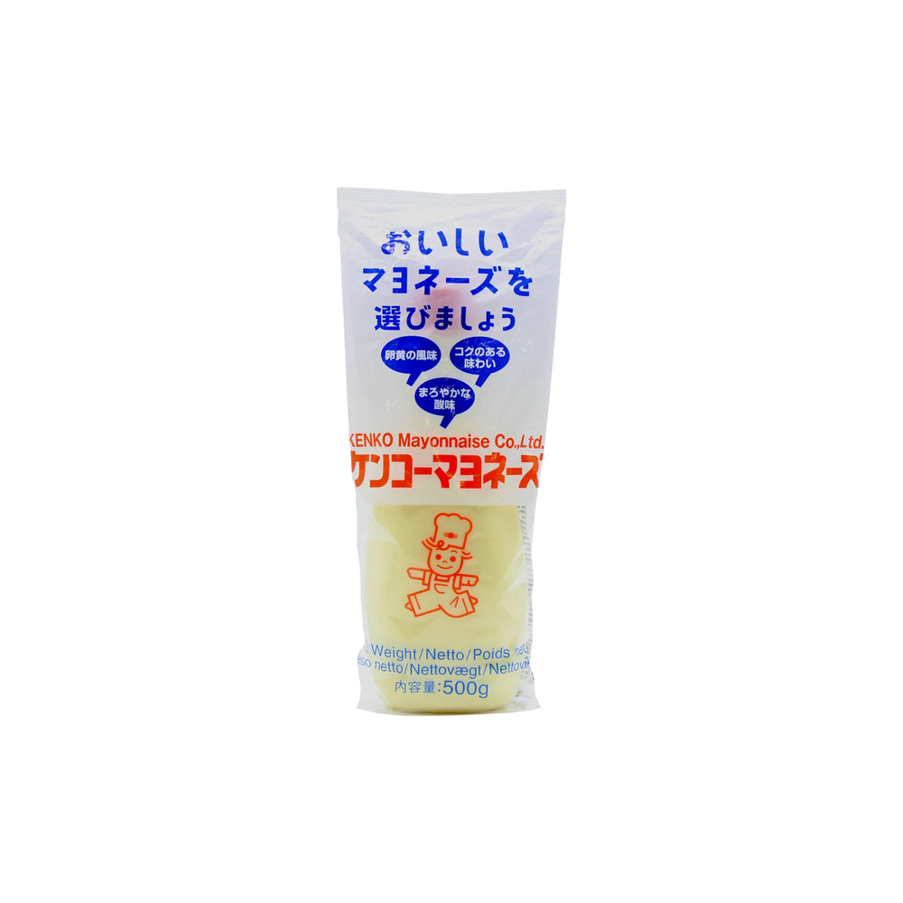 Kenko Mayonnaise - 500g: Features blue Japanese text and a red mascot logo on a white package, ideal for bringing authentic umami flavour to your Japanese dishes.