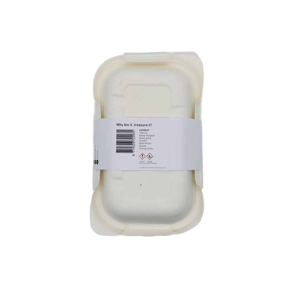 
                  
                    A closed, rectangular, white compostable food container with a white paper label for Kintsugi Kits - Gold, Silver & Bronze, inspired by Kintsugi’s artful repairs, shown against a plain white background.
                  
                