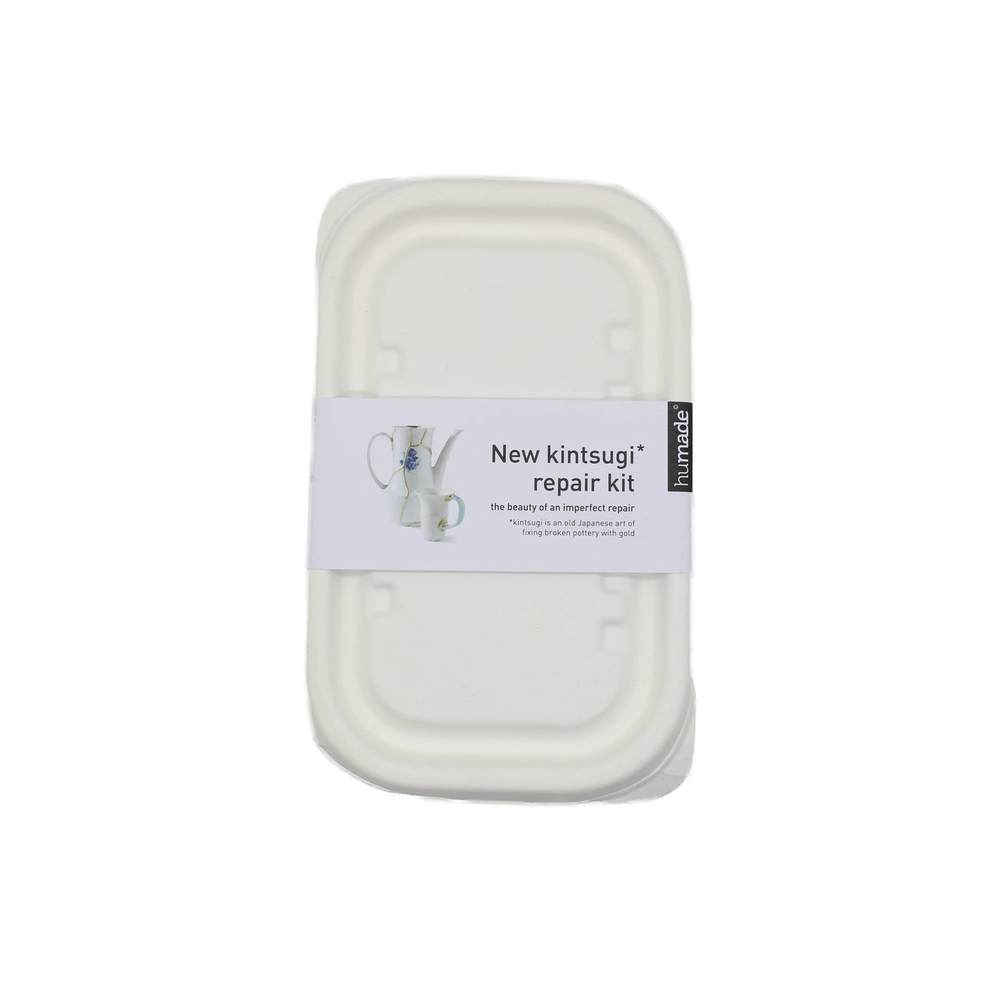 A rectangular white box labeled Kintsugi Kits - Gold, Silver & Bronze features an image of a cup with a striking metallic repair on the packaging.