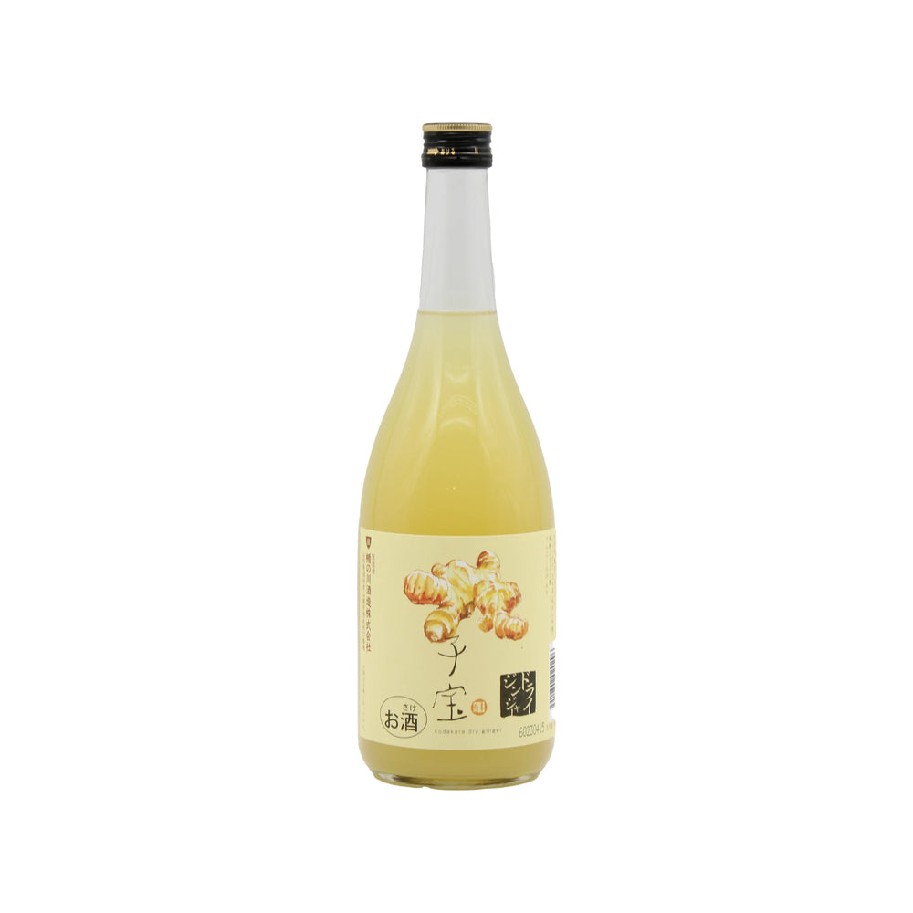A clear glass bottle with a beige label illustrated with ginger and Japanese text contains Kodakara Ginger Sake - 720ml, filled with yellowish liquid from Tatenokawa Shuzo.