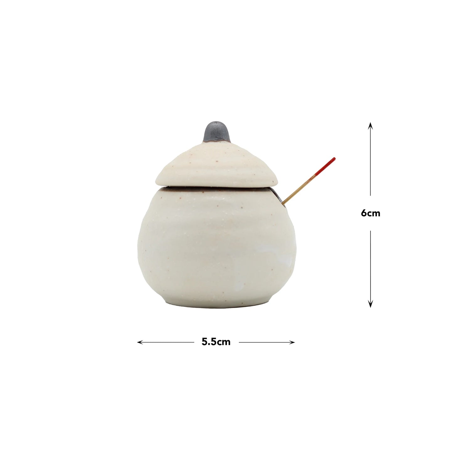 The Karashi / Shichimi Spice Pot - White Kohiki is a small white ceramic pot with lid and spoon, inspired by Japanese pottery, measuring 6 cm high and 5.5 cm wide—ideal for storing seasonings.