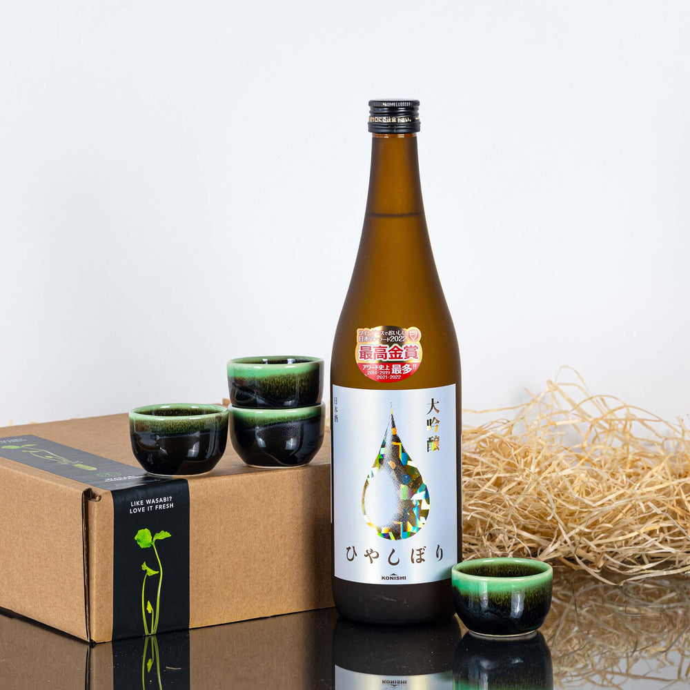 
                  
                    Konishi Gold Sake with Set of Four Sake Cups
                  
                
