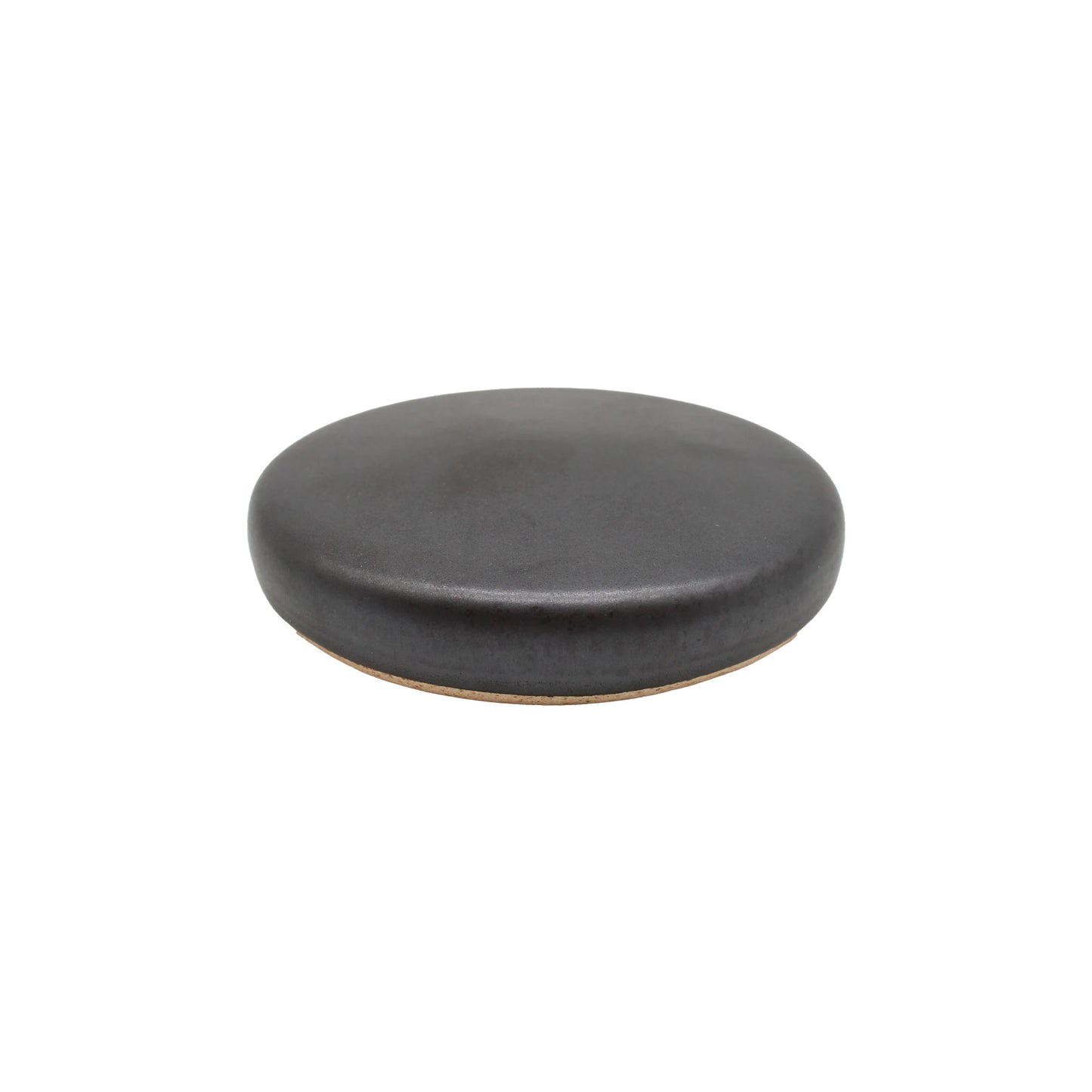 
                  
                    The Ishiyaki - Grilling Stone is a round, flat, black ceramic plate with a smooth, minimalist design inspired by Japanese stone grilling, shown on a white background.
                  
                