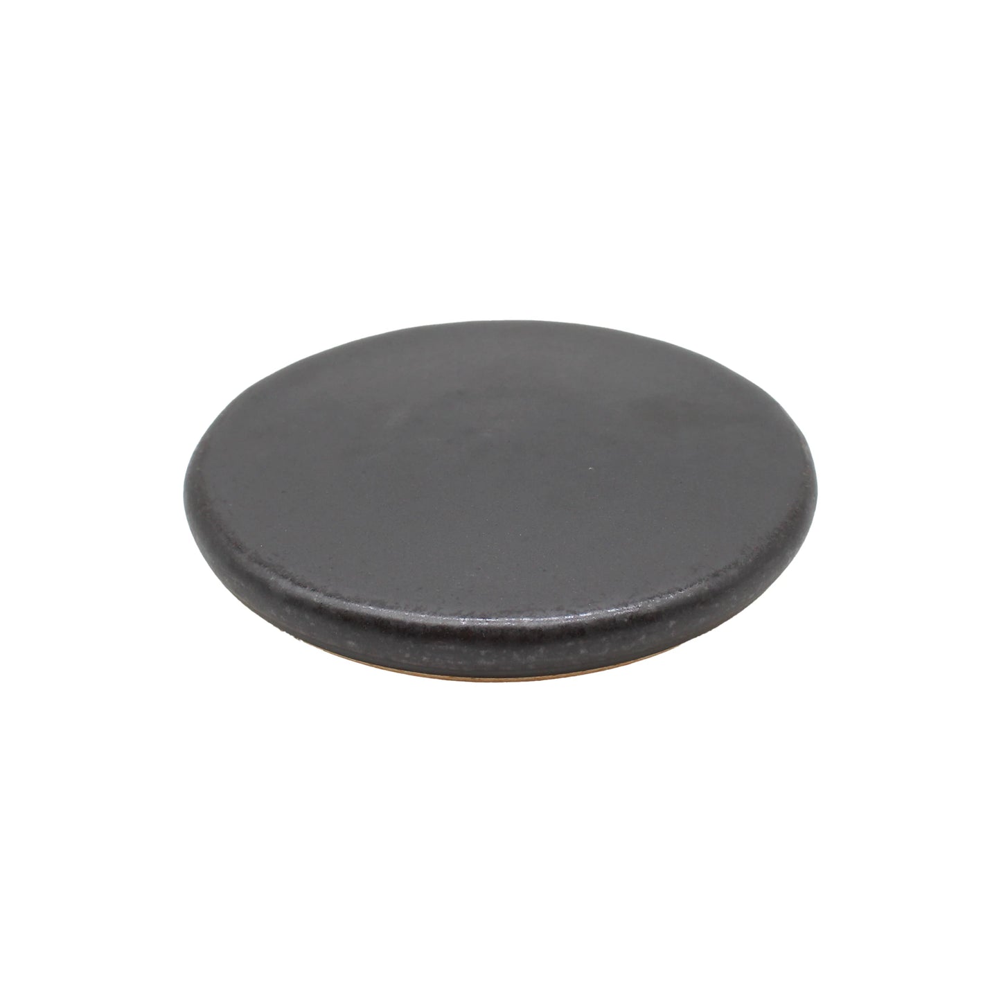 
                  
                    The Ishiyaki - Grilling Stone, a round and flat dark gray ceramic plate inspired by Japanese stone grilling, is photographed against a white background.
                  
                