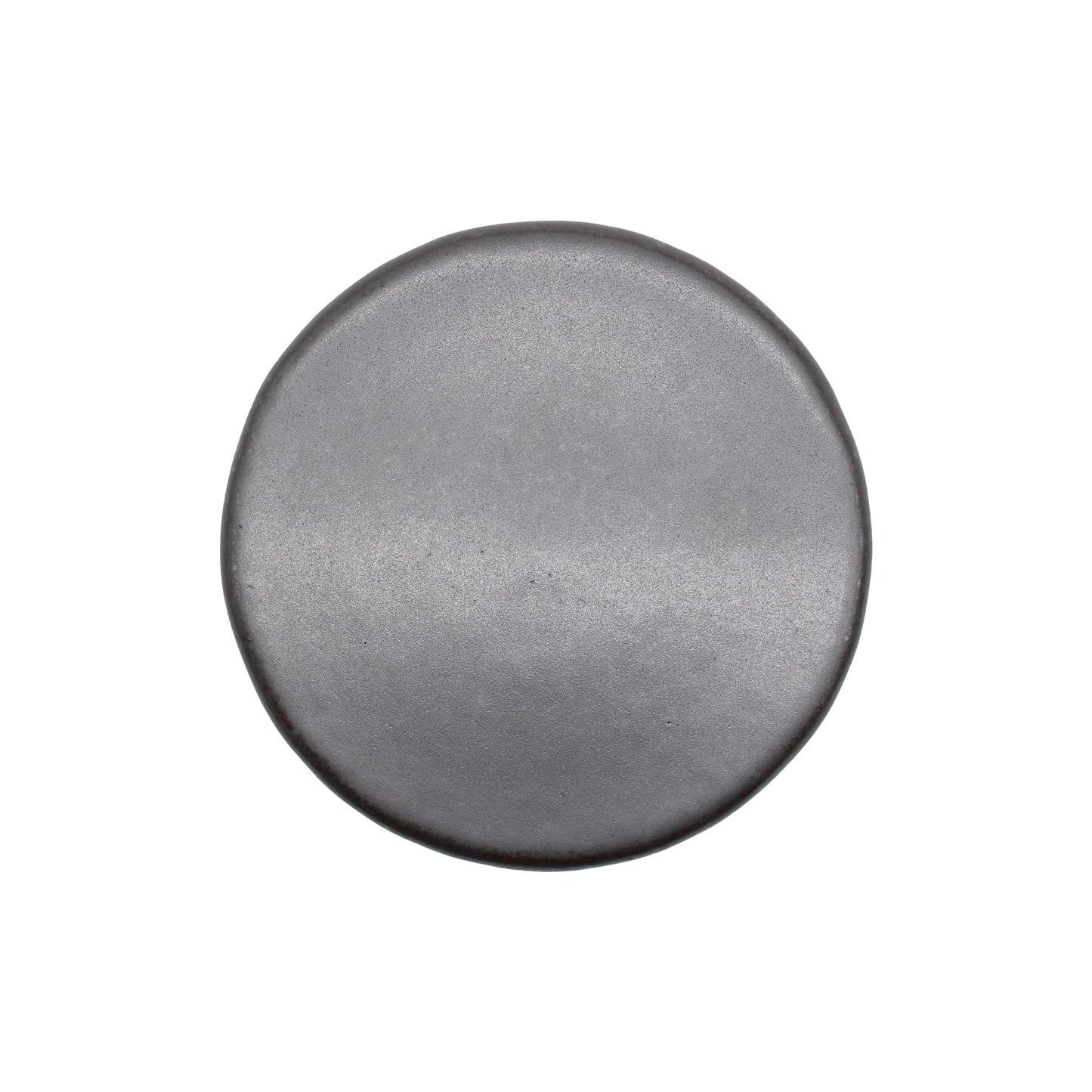 
                  
                    The Ishiyaki Grilling Stone is a round, flat, metallic gray disk with a smooth surface, resembling a volcanic cooking stone and shown on a white background.
                  
                
