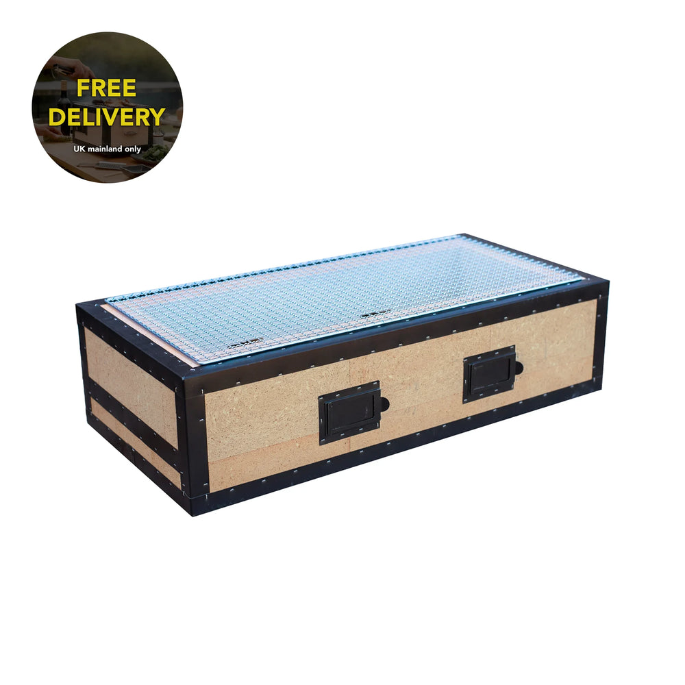 
                  
                    The Konro Grill, Table Barbecue - 69cm features a rectangular wooden and metal design with a mesh top, two handles, and a Free Delivery UK mainland only sticker—crafted from sturdy materials like those in Japanese charcoal grills.
                  
                