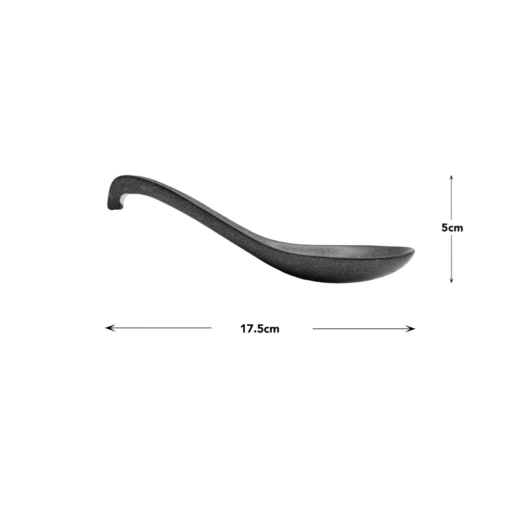 
                  
                    The Spoon - Matt Black, made from Minoyaki porcelain, is shown in profile with a curved handle and labeled arrows marking its 17.5 cm x 5 cm dimensions.
                  
                