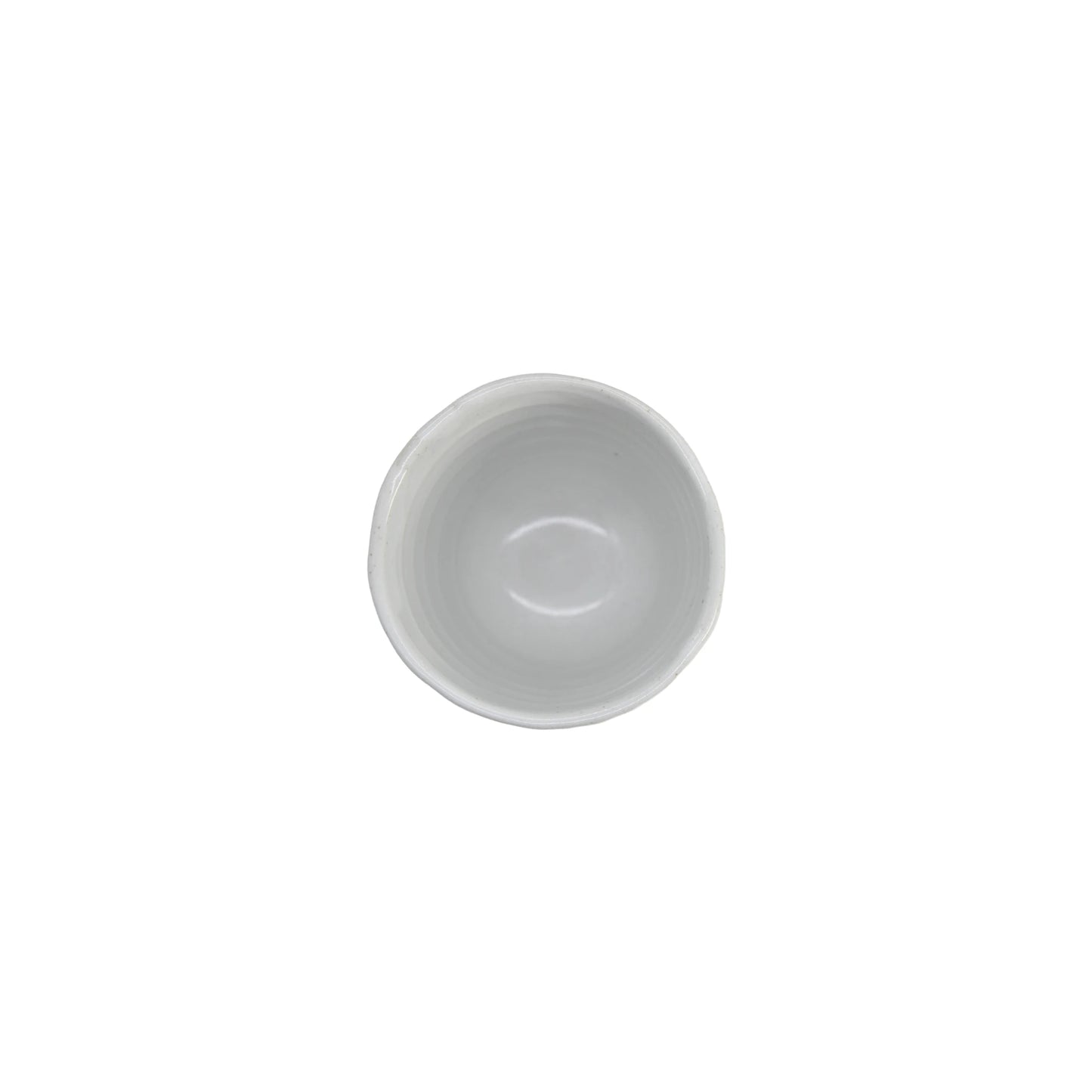 
                  
                    A top-down view of the Lopsided Mug - White And Bisque showcases its simple, elegant Japanese-inspired design with a plain white ceramic body and an earthenware bisque base, set against a white background.
                  
                