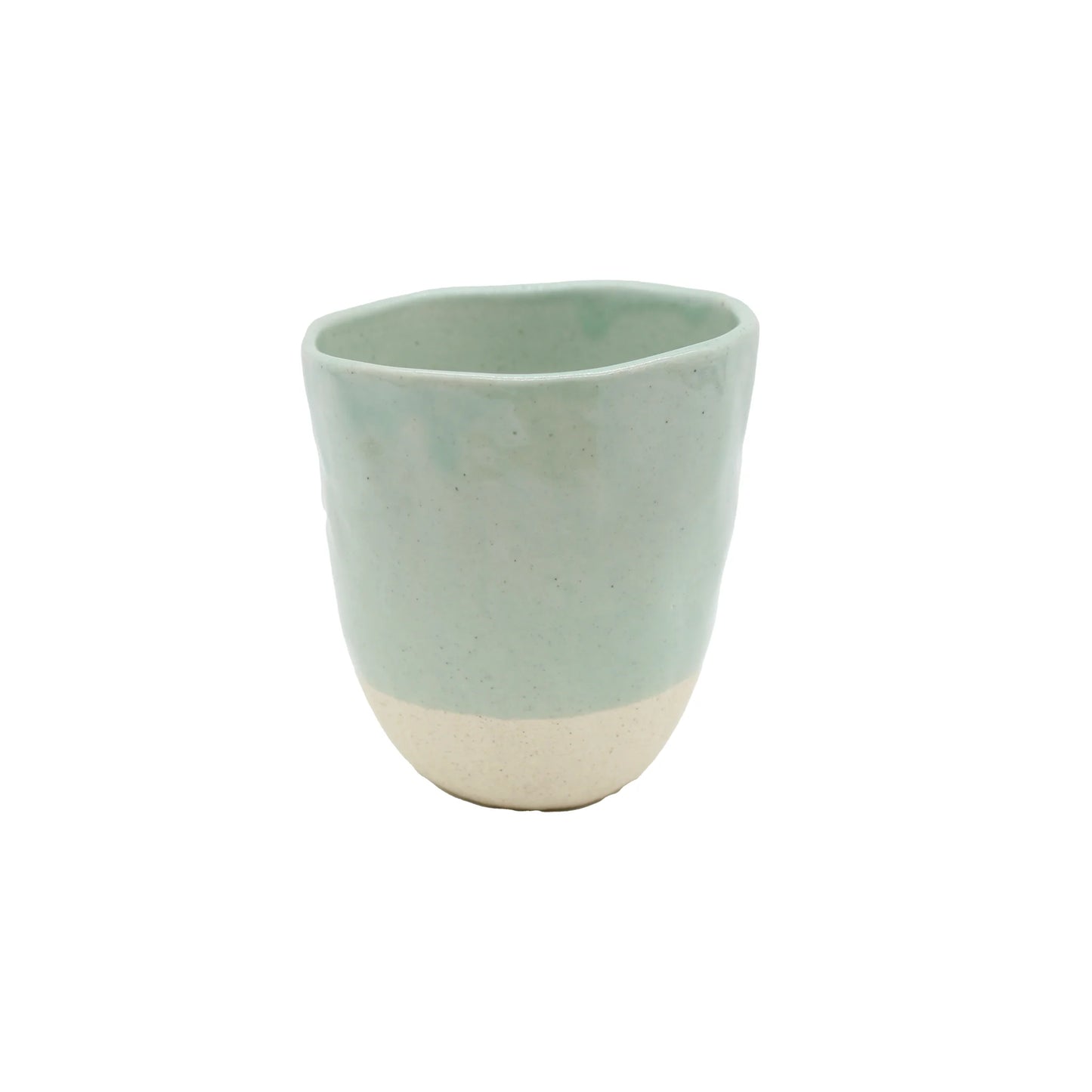 The Lopsided Mug - Tomei Blue is a handmade ceramic cup featuring a blue glazed upper half and an unglazed earthenware base, shown on a white background.