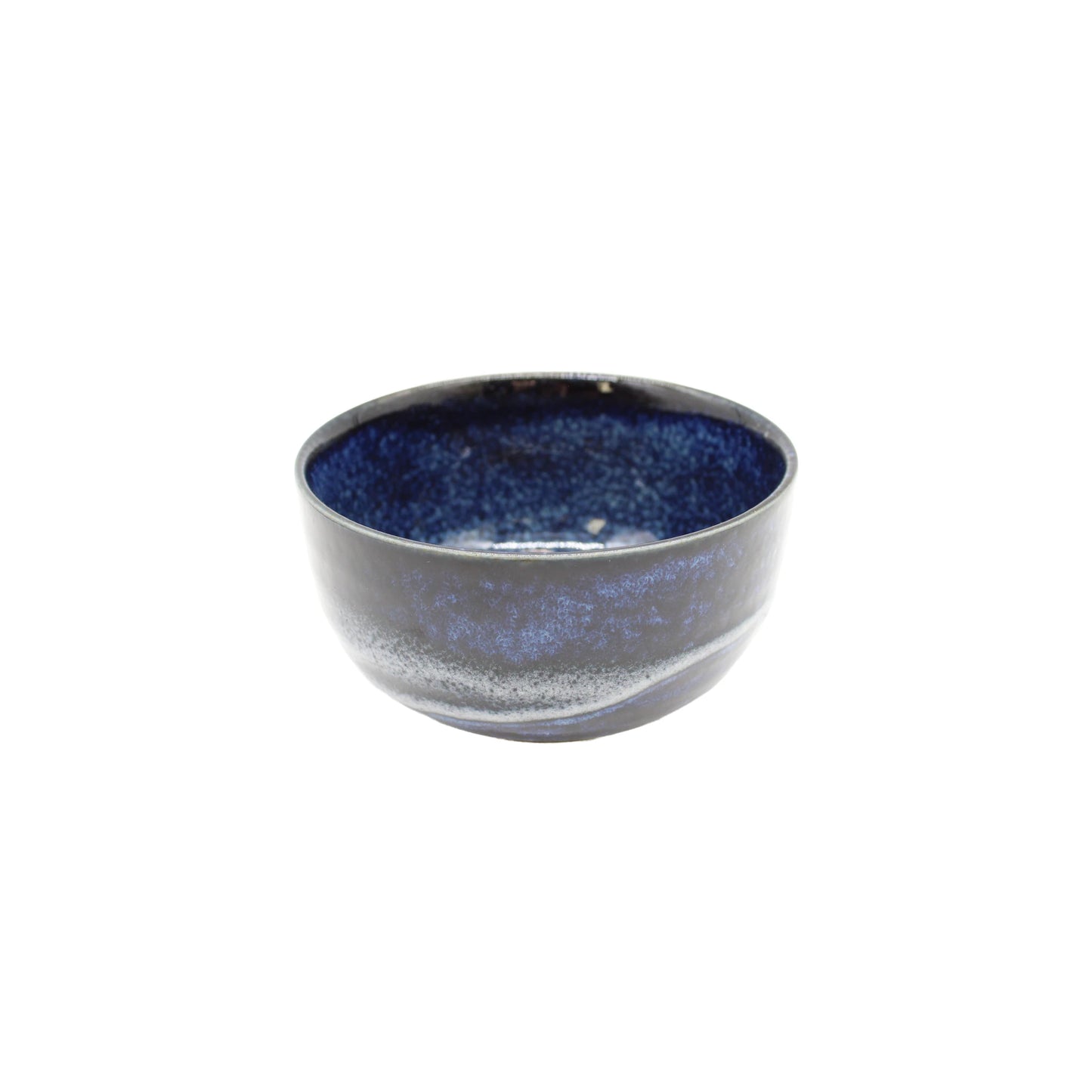 The Matcha Tea Set - Blue features a ceramic bowl with a dark blue, speckled interior and glossy exterior, ideal for traditional Japanese tea making or use with a bamboo whisk.