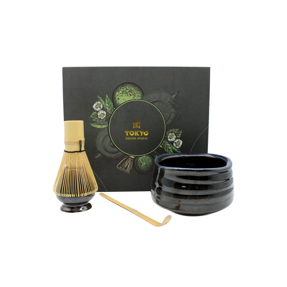 
                  
                    Experience the Japanese tea ceremony with the Matcha Tea Set - Black, featuring a ribbed black bowl, bamboo whisk and scoop, all beautifully packaged with a Tokyo Design Studio box in the background.
                  
                
