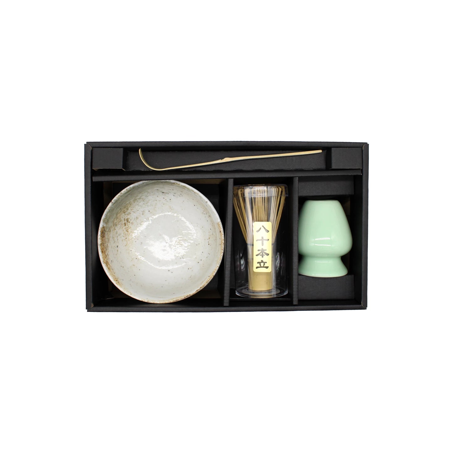The Matcha Tea Set - Yukishino includes a matcha bowl, whisk, ceramic cup, and metal scoop, all beautifully boxed with each item in its own compartment.