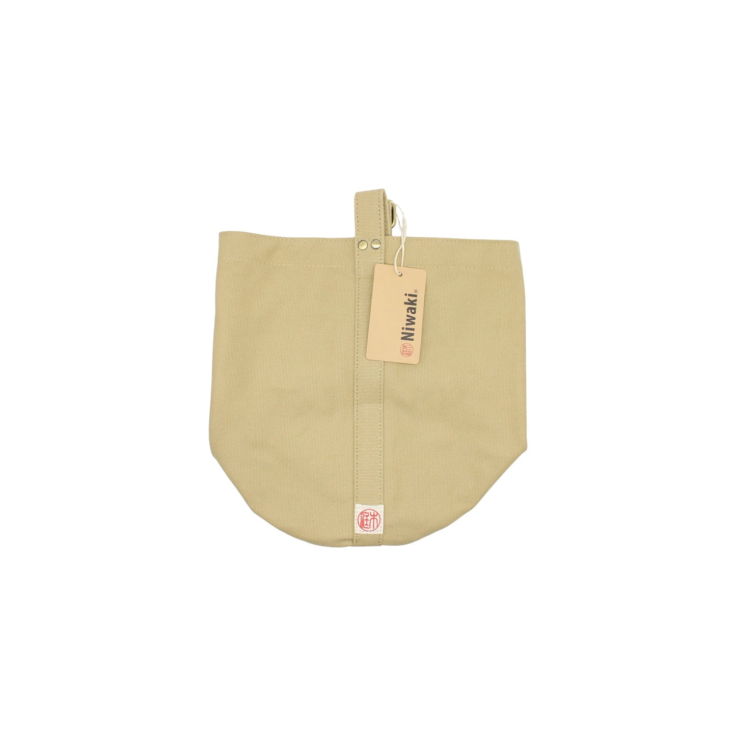 
                  
                    The Mini Kantan Bag - Tan is a beige bucket bag with a buttoned strap and a tan rectangular Miwaki tag. Made from water-resistant canvas, it features a small red logo at the bottom center for everyday use.
                  
                