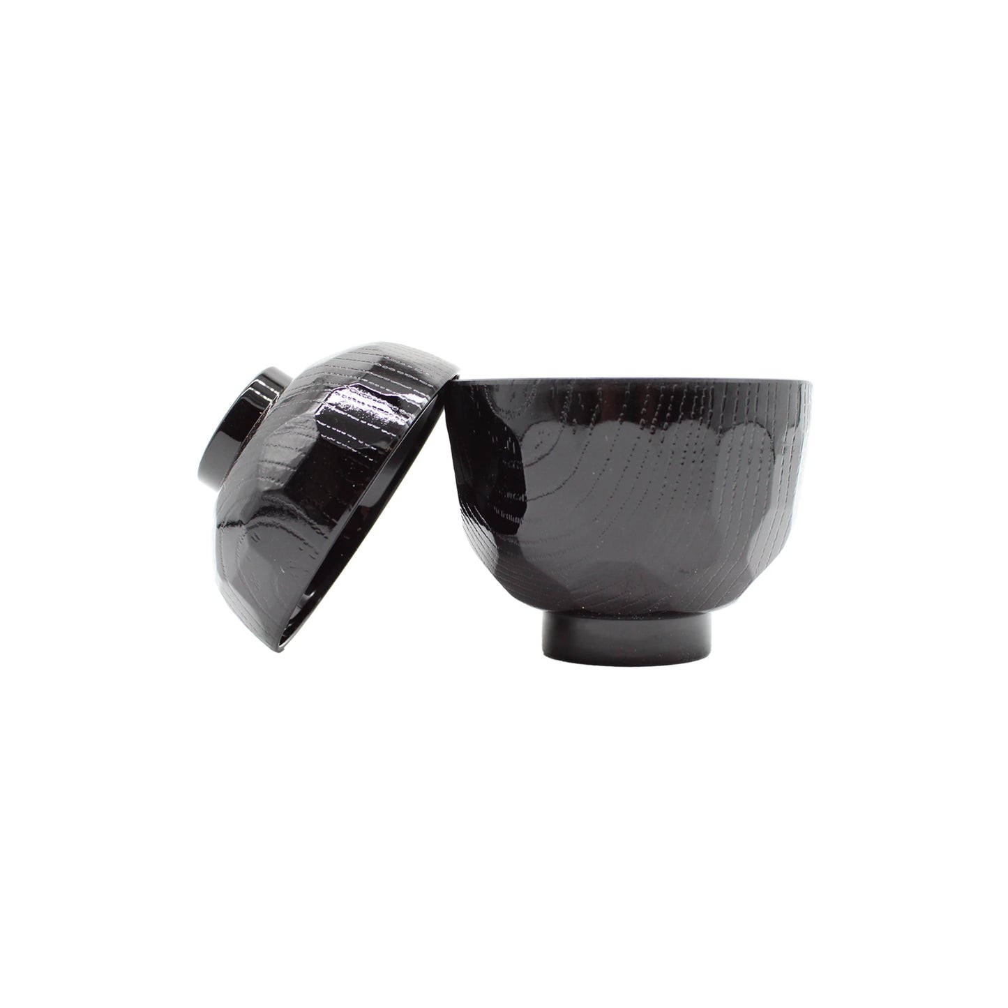 
                  
                    The Miso Bowl With Lid - Black features a subtle wood grain texture and an elegant Japanese lacquer finish. Made from durable ABS plastic, this miso soup bowl with a matching lid is perfect for stylish tableware settings.
                  
                