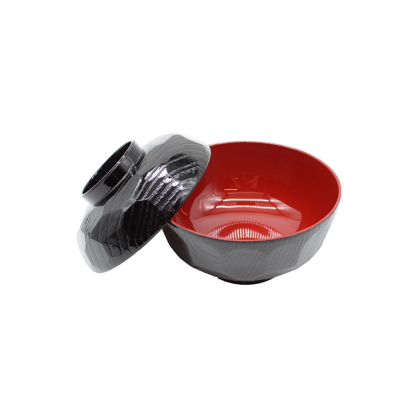 
                  
                    The Miso Bowl With Lid features a black and red Japanese lacquerware design with a textured exterior and a matching lid—ideal for serving miso soup.
                  
                