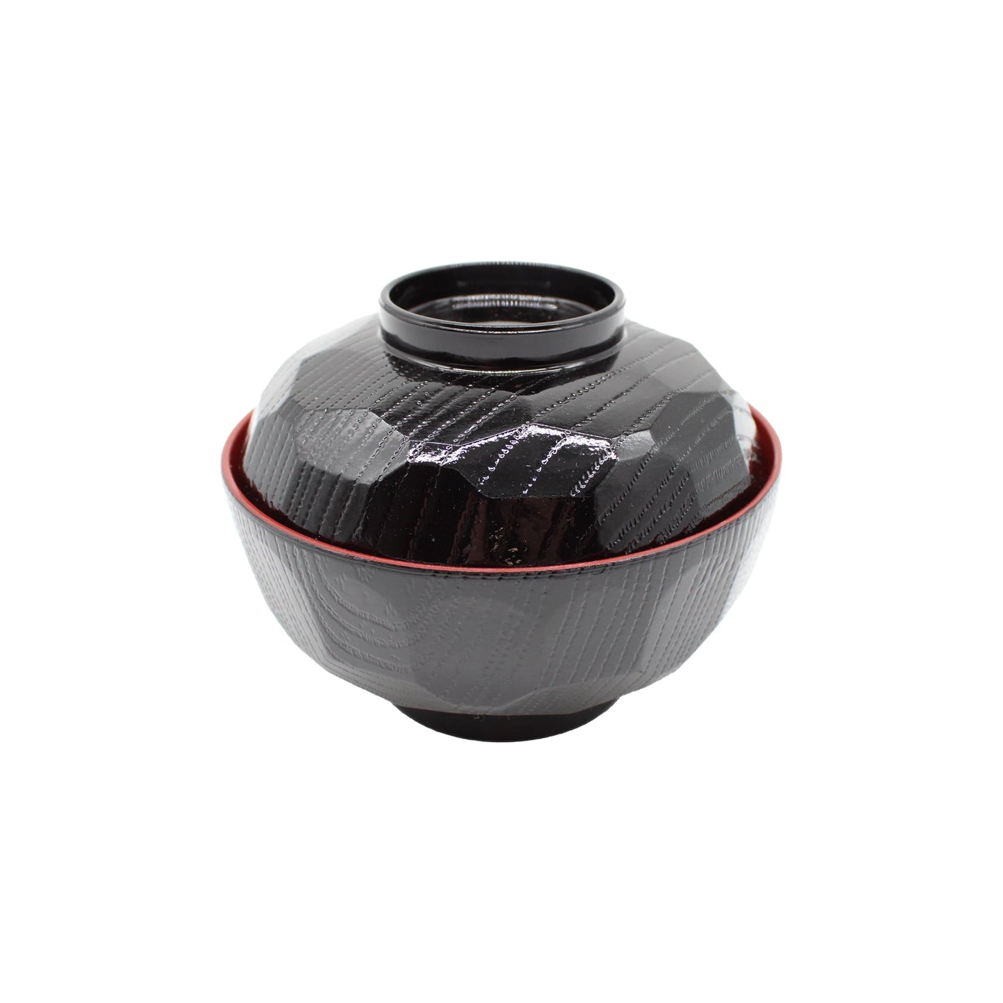 
                  
                    The Miso Bowl With Lid is a black, textured Japanese lacquerware bowl featuring subtle geometric patterns, a red inner rim, and a matching lid, displayed against a white background.
                  
                