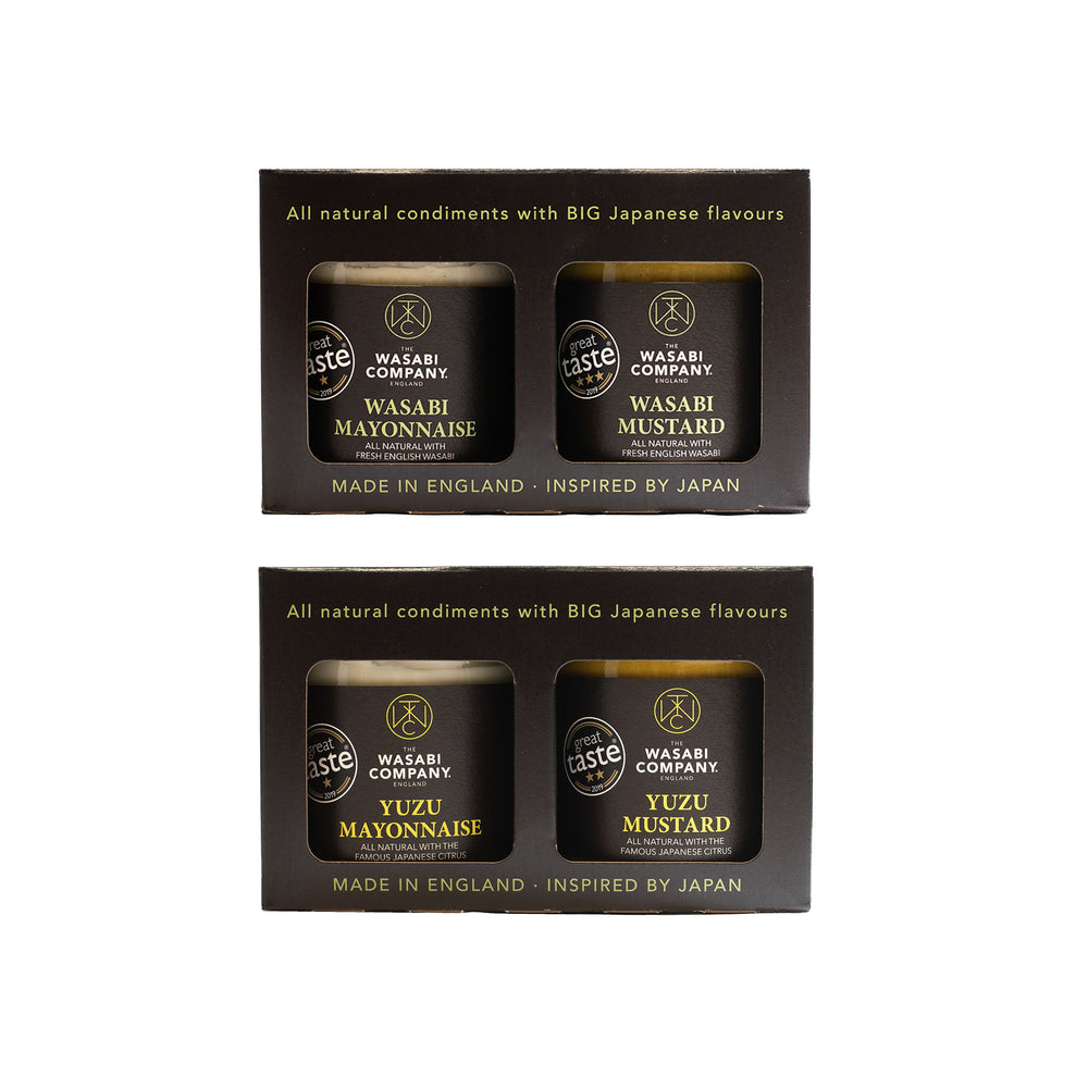 The Wasabi & Yuzu Double Twin Packs feature two black cardboard packs: one with Wasabi Mayonnaise and Wasabi Mustard, the other with Yuzu Mayonnaise and Yuzu Mustard—perfect for adding bold flavor to any dish.