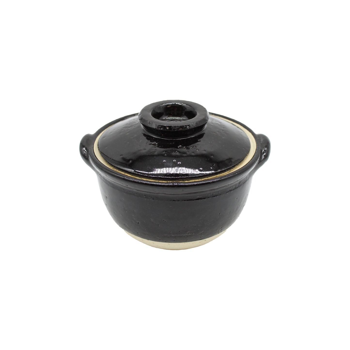 
                  
                    Mini Donabe Pot - Black: A small black ceramic donabe pot with handles and a fitted lid, accented by a natural-colored rim and base, inspired by traditional Japanese earthenware, shown isolated on a white background.
                  
                