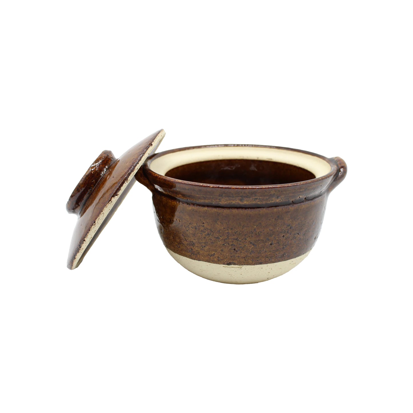 
                  
                    The Mini Donabe Pot - Ame is a brown ceramic vessel with a partially open lid that reveals its empty interior. Crafted in the tradition of Japanese handmade tableware, this Iga ware piece features a cream-colored base and two small side handles.
                  
                
