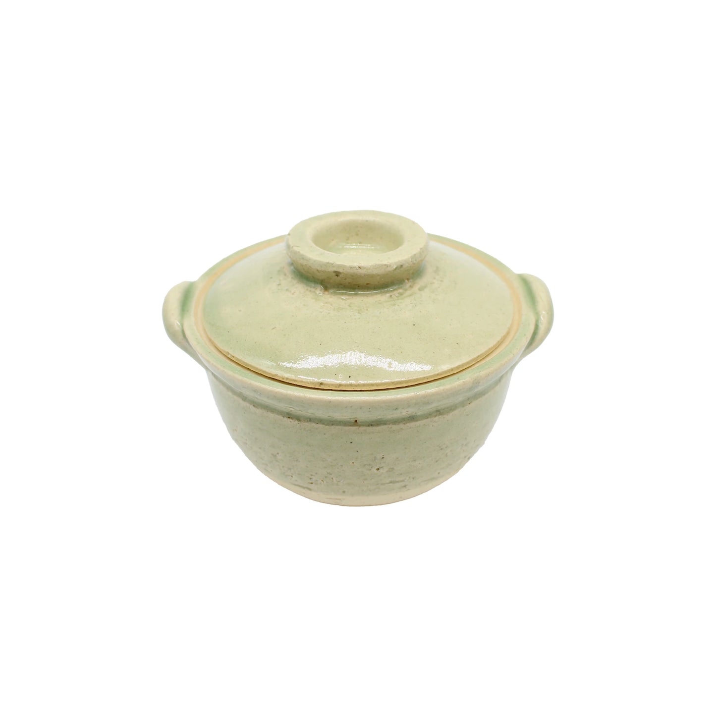 
                  
                    Small green ceramic mini donabe pot with a lid and two side handles, photographed against a white background—an elegant piece of Japanese tableware inspired by traditional Iga ware.
                  
                