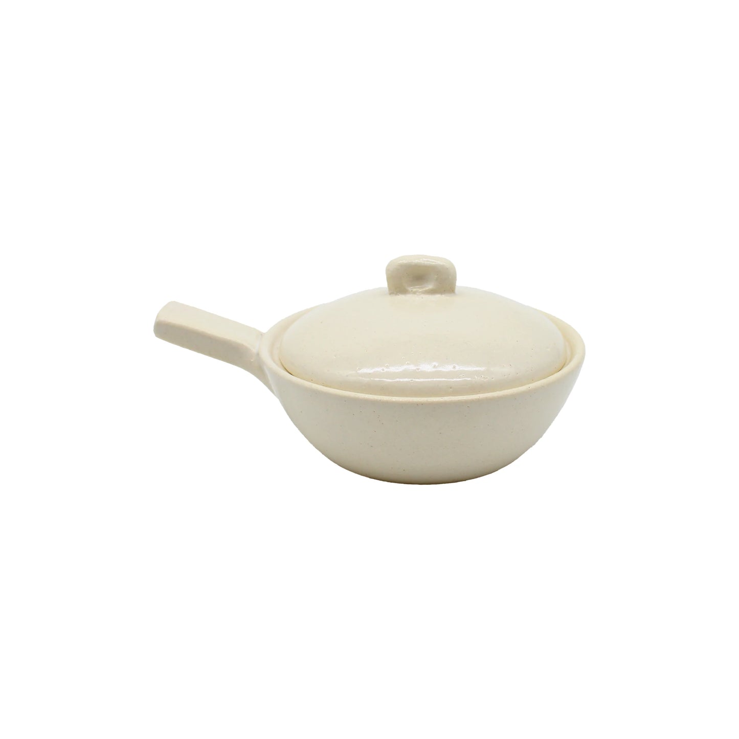 The Mini Baking Dish - White is a cream-colored ceramic baking dish with a lid and side handle, displayed on a plain white background—ideal for use as an individual oven dish or as a charming Japanese mini baking dish.