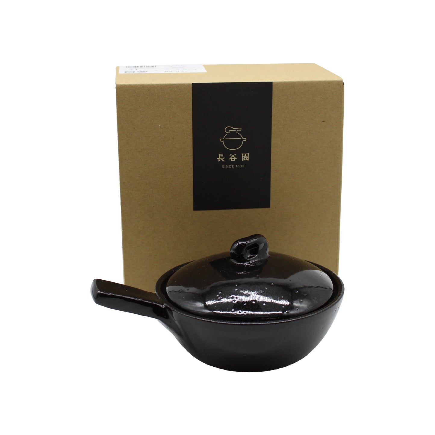 
                  
                    A Mini Baking Dish - Black, crafted from ceramic with a lid and ideal for serving individual baked dishes in Japanese style, is positioned in front of a brown cardboard box adorned with Japanese text and a teapot illustration.
                  
                
