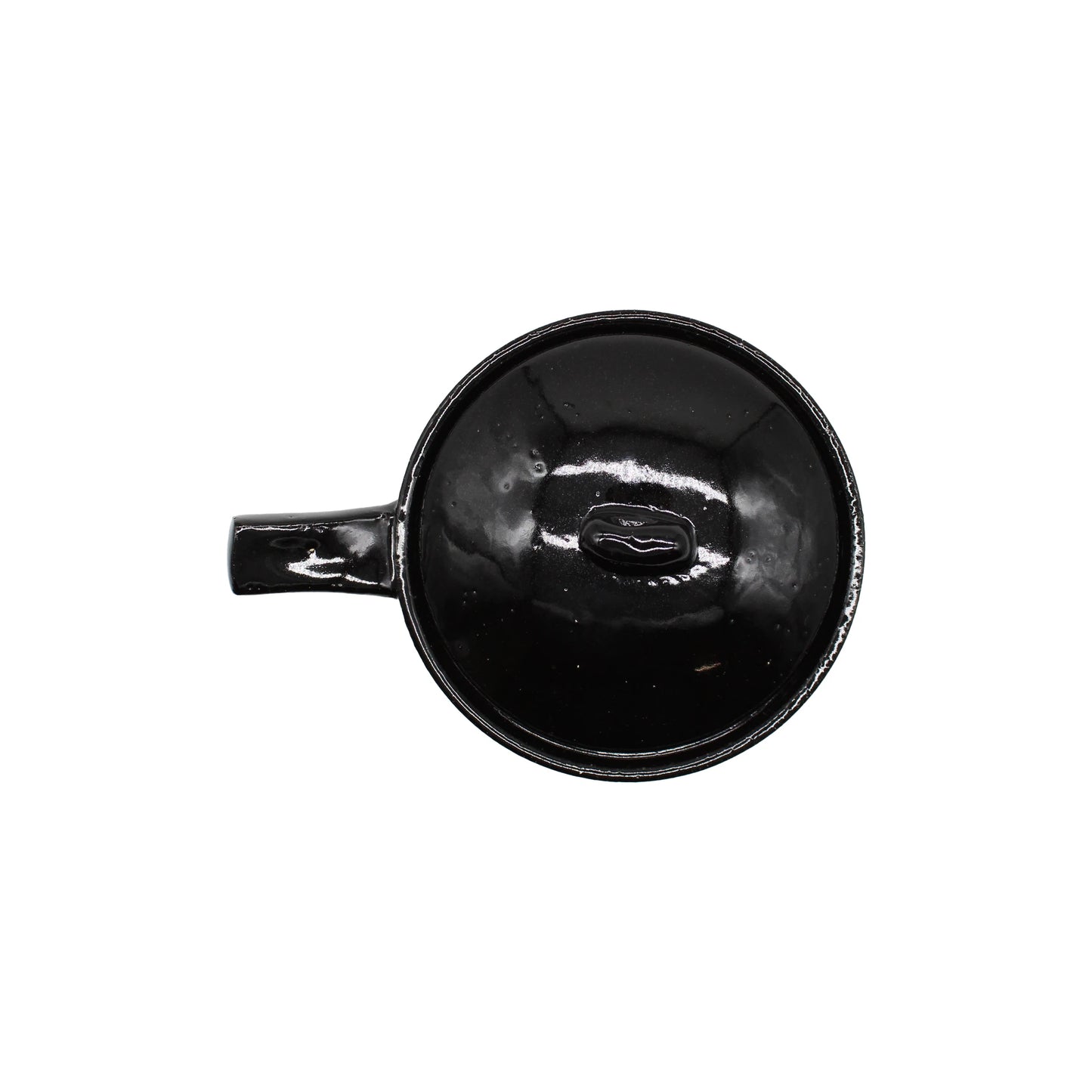
                  
                    A black Mini Baking Dish viewed from above, showing its round shape, handle on the left, and a glossy surface with subtle reflections—perfectly capturing the look of a Japanese-style individual baking dish.
                  
                