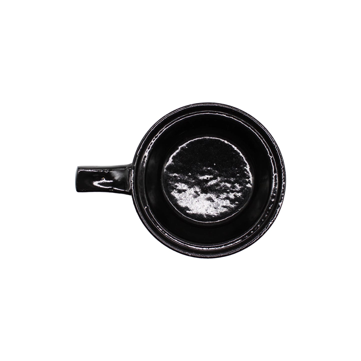 
                  
                    A Mini Baking Dish - Black, featuring a handle and photographed from above, is empty and set against a white background.
                  
                