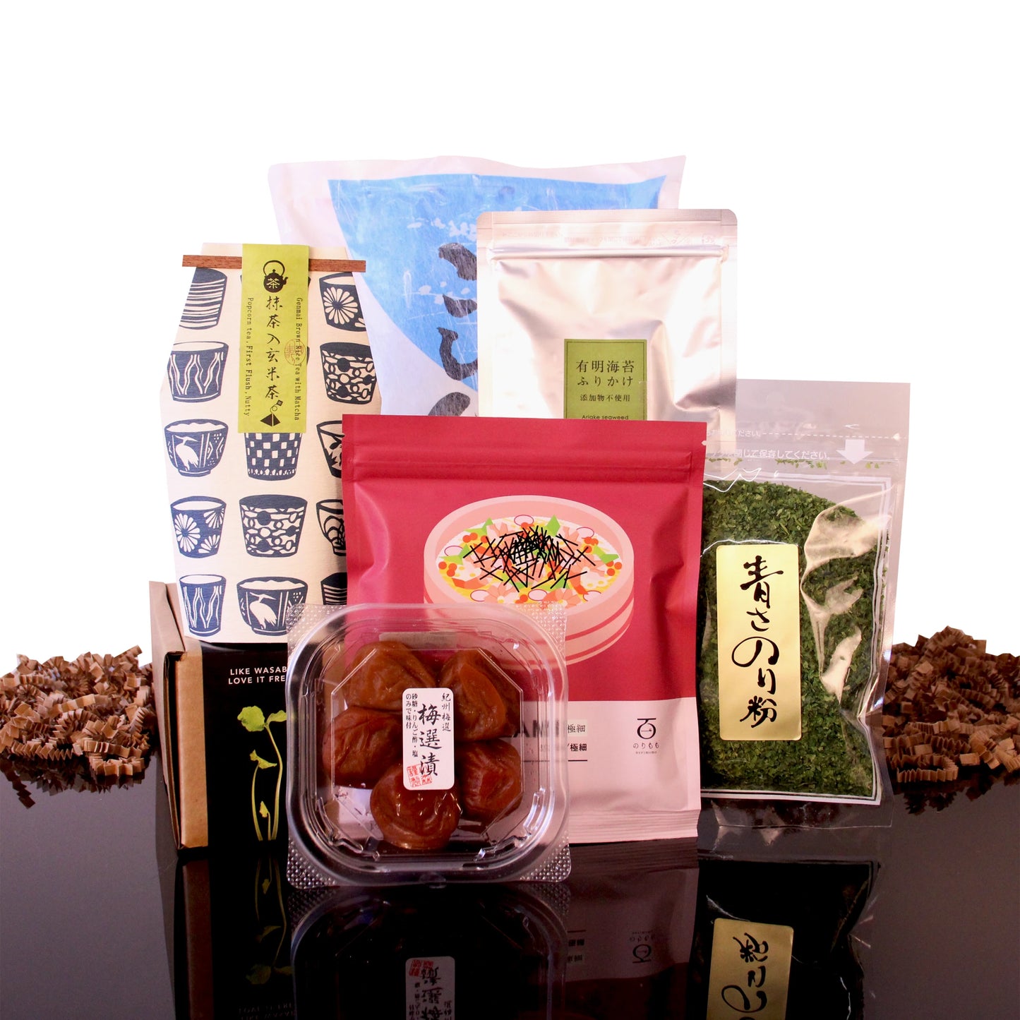 An Ochazuke (Green Tea Over Rice) Set including a box of genmaicha green tea, pickled plums, and pouches of seaweed and seasoning.