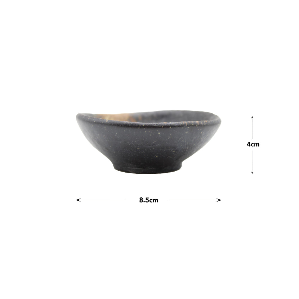The Soy Sauce Dish - Ochoko Black Bizen is a small black Bizen ceramic bowl with a speckled finish, perfect for soy sauce. It measures 8.5 cm in diameter and 4 cm in height.