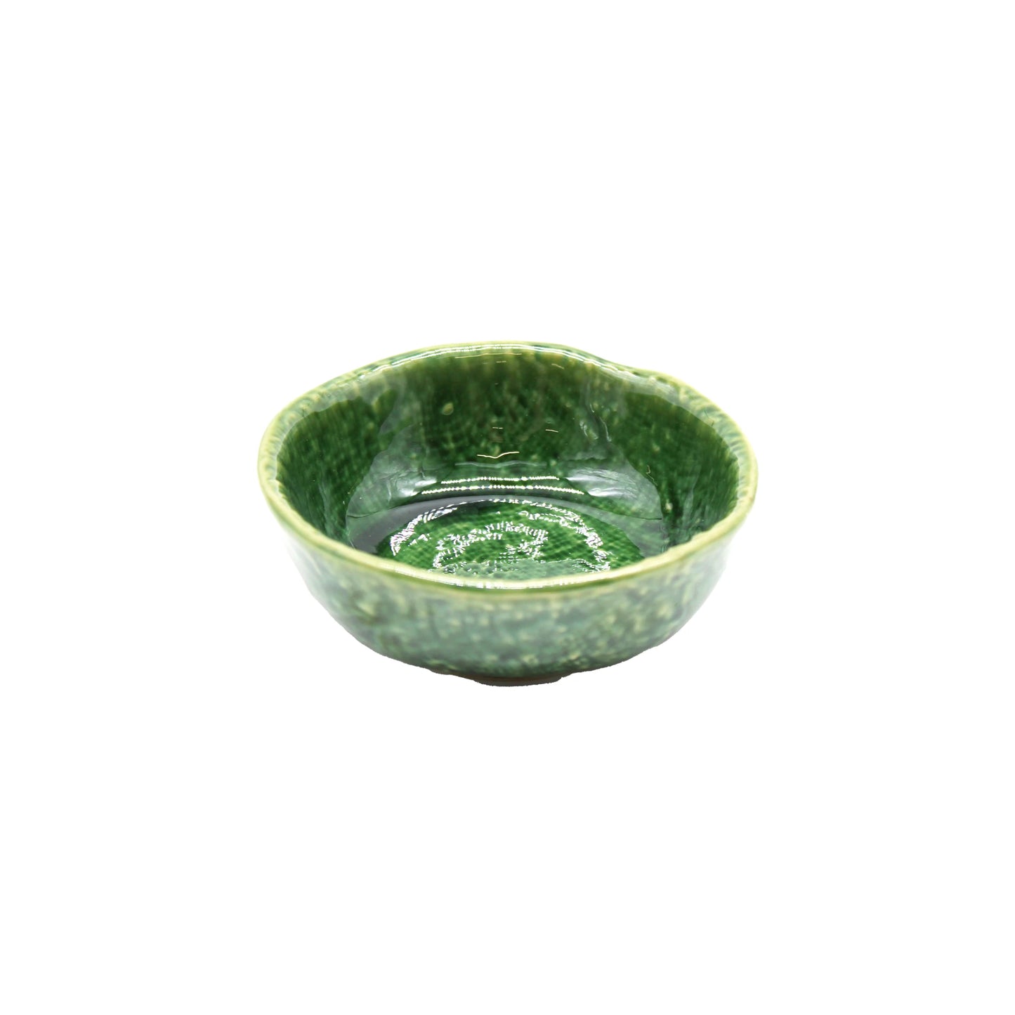The Soy Sauce Dish - Oribe Green is a small, round ceramic bowl with a glossy, textured green finish inspired by Oribe ware, shown against a white background.
