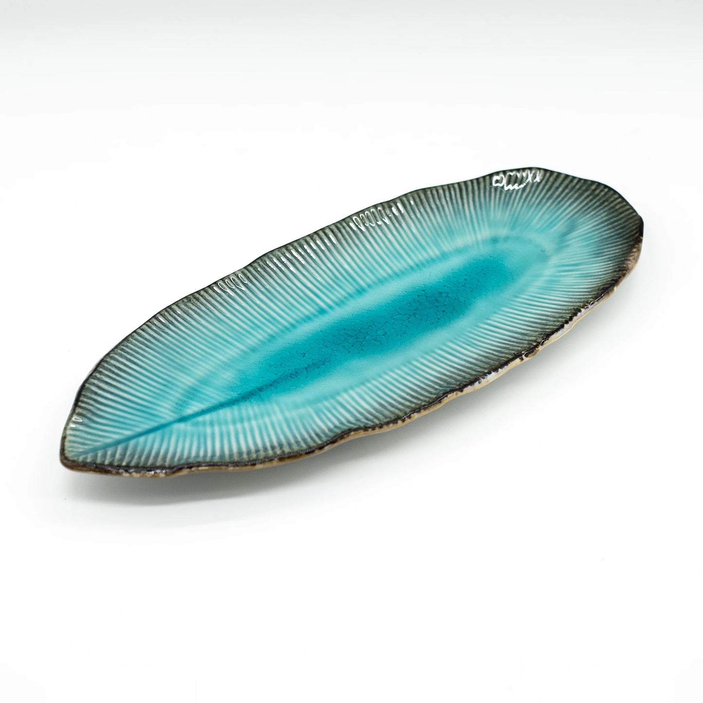 The Sashimi Platter - Oval in Sky Blue 32cm features a ribbed porcelain texture and dark edging, photographed against a white background.
