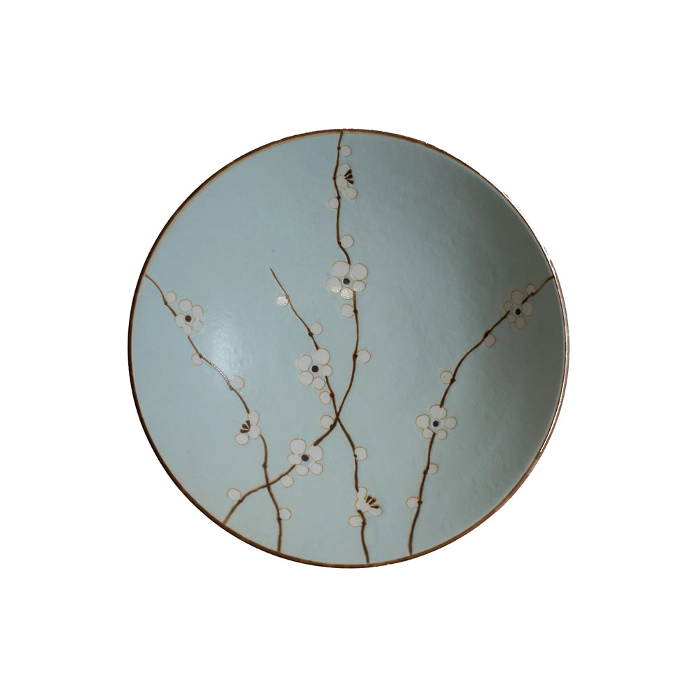The Ramen Bowl - Light Blue Cherry Blossom features a light blue porcelain glaze accented by delicate brown branches and subtle white cherry blossom patterns.