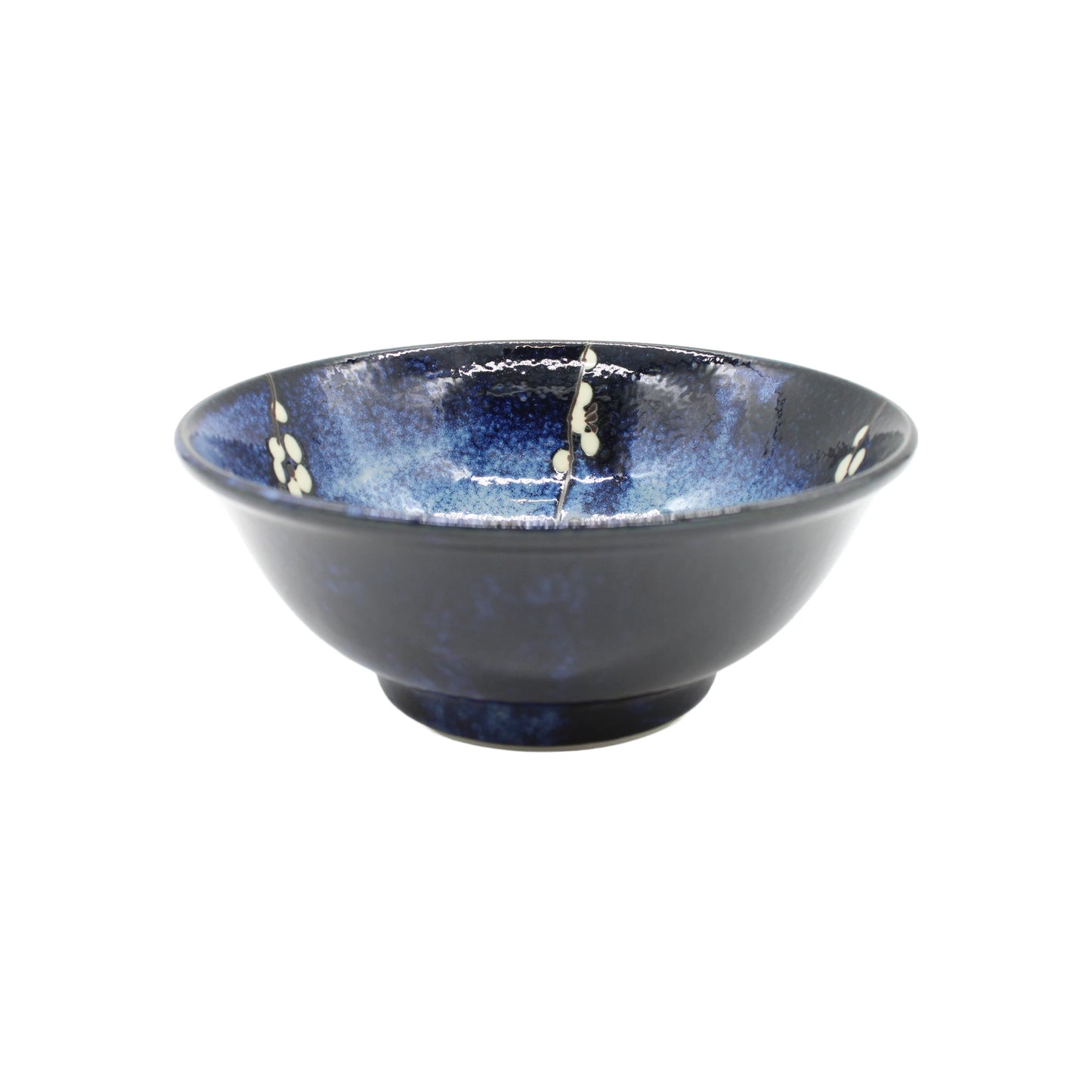 
                  
                    The Ramen Bowl - Blue Cherry Blossom is a shallow, round ceramic bowl featuring a glossy dark blue and black glaze with small white dots inspired by Japanese art.
                  
                