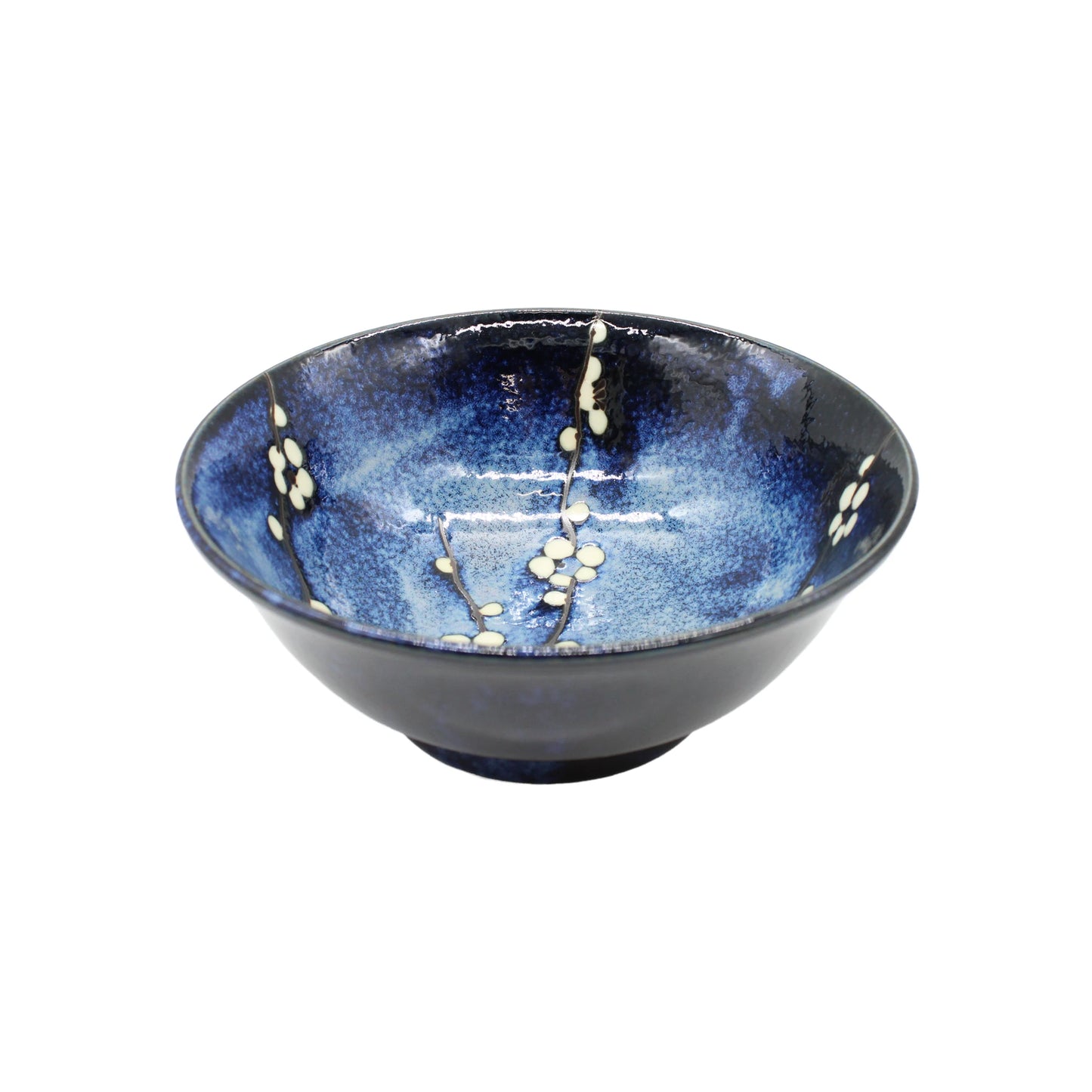 The Ramen Bowl - Blue Cherry Blossom features a blue glaze with white cherry blossom designs, inspired by traditional Japanese art, adorning both the interior and exterior.
