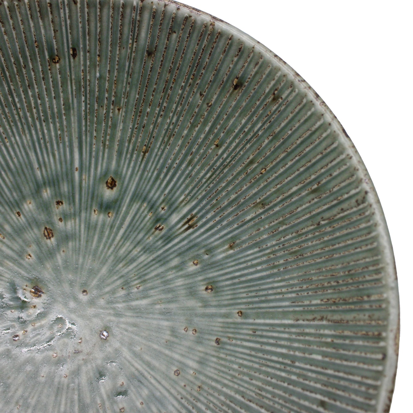 Close-up of the Ramen Bowl - Etched Green Lines, crafted in Minoyaki porcelain with a textured radial pattern, green glaze, and brown speckles—an exquisite piece of handcrafted tableware.