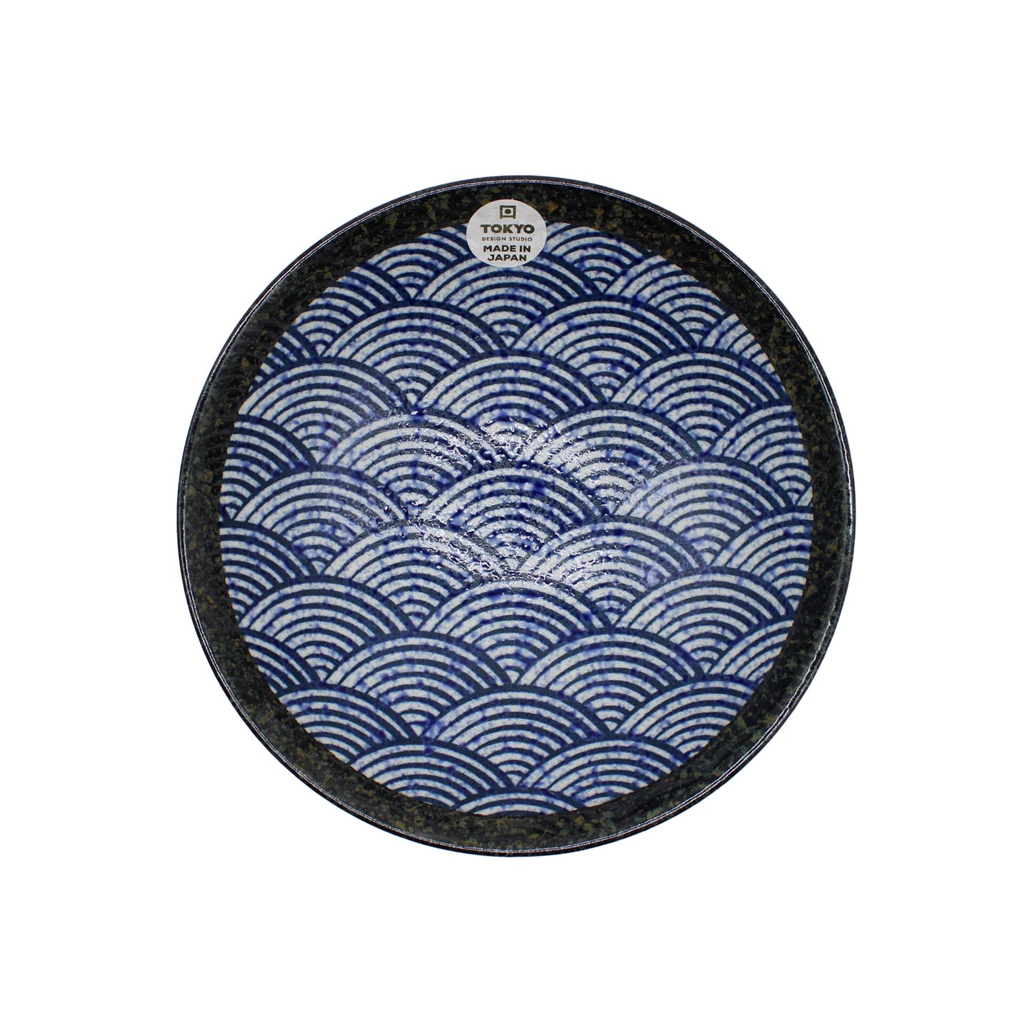 
                  
                    The Ramen Bowl - Blue Wave is a round Minoyaki porcelain bowl with a blue and white wave pattern and a top-center label reading Tokyo Design Studio Japan. Inspired by handmade Japanese designs.
                  
                